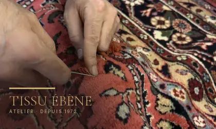 Retissage à l&rsquo;aiguille sur un tapis persan, à l&rsquo;atelier Tissu Ébène