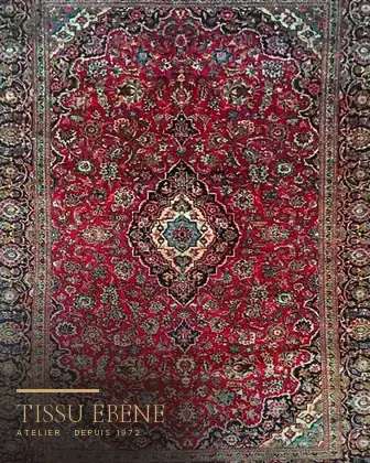 Tapis Kashan 1920 après restauration — trous retissés à l’aiguille